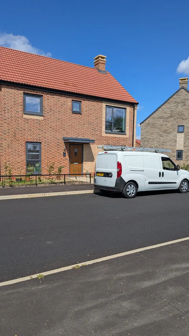 Hamblin Property Care van at a residential exterior cleaning job