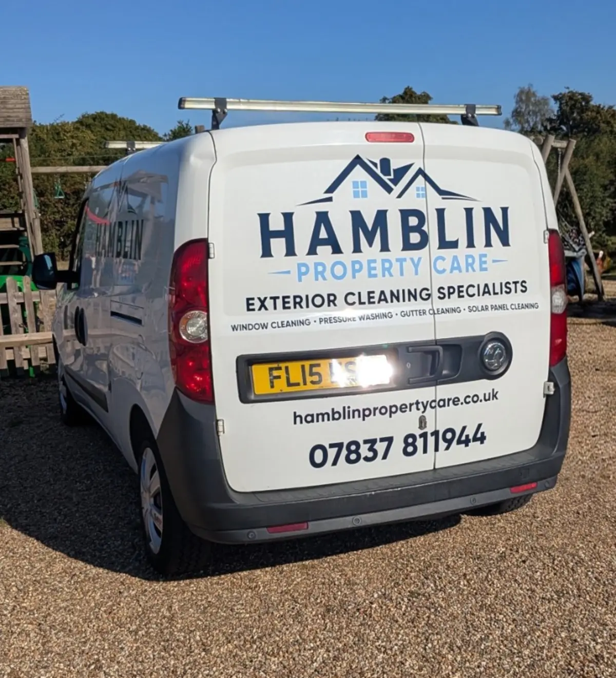 Signwritten Hamblin Property Care van working locally