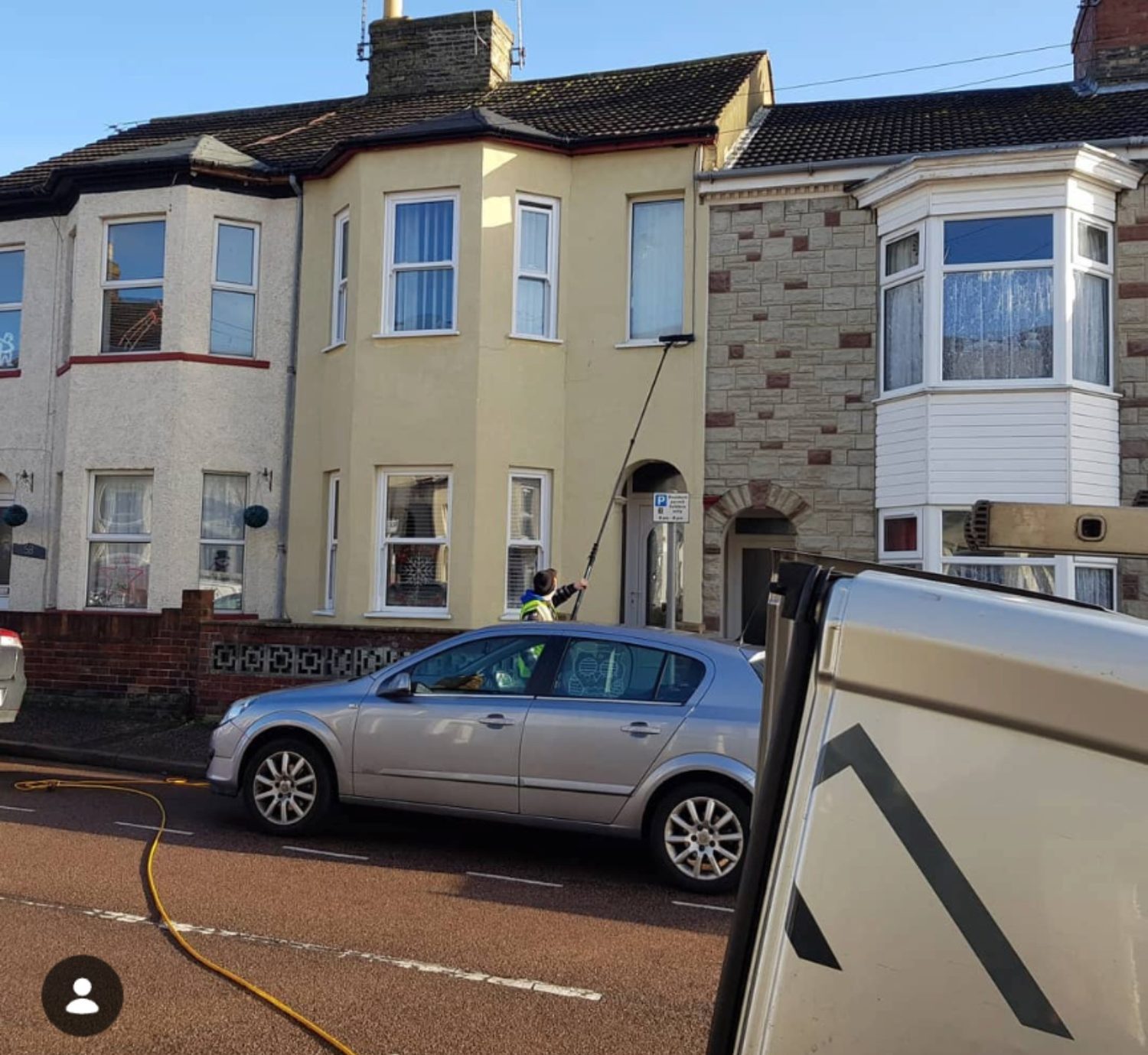 Residential window cleaning using a water-fed pole system