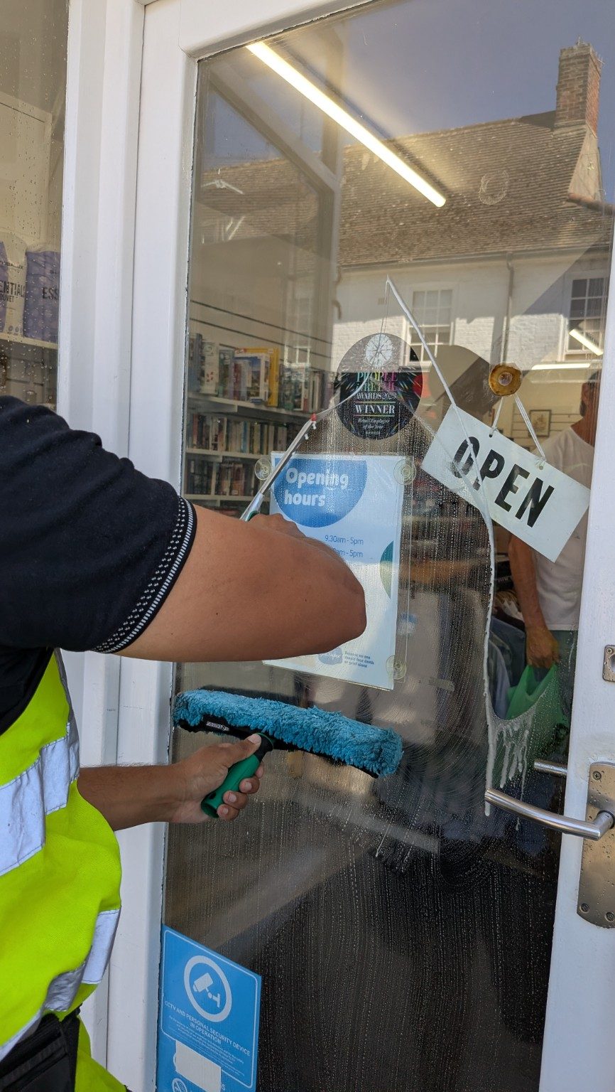 Traditional squeegee window cleaning in Southwold Suffolk