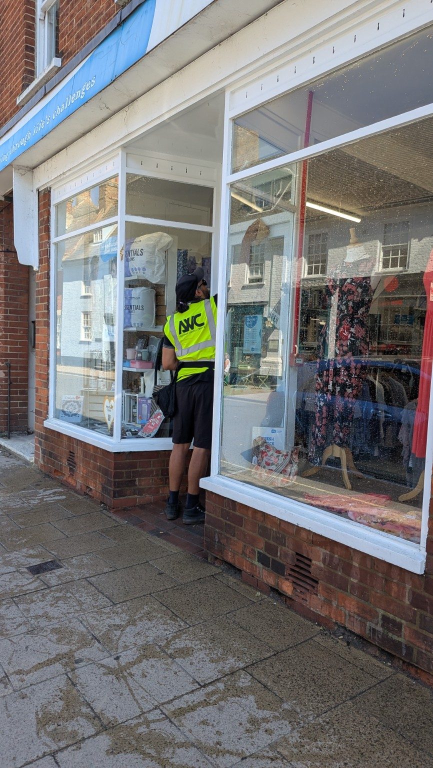 Window cleaning on a Southwold high street property in Suffolk